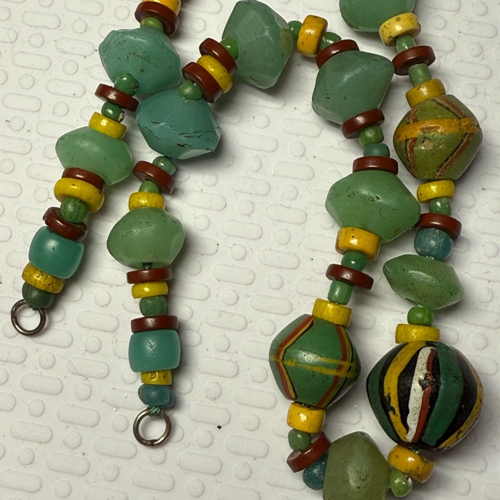 3.)Uranium glass, trading beads. No clasp